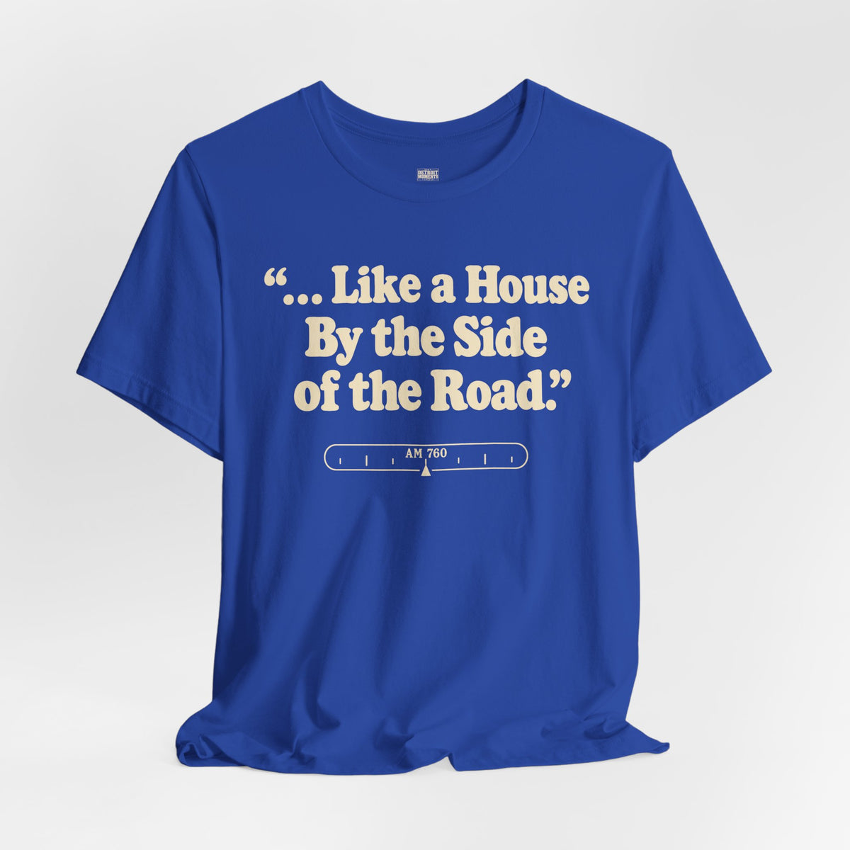 “... Like a House by the Side of the Road.” Tee