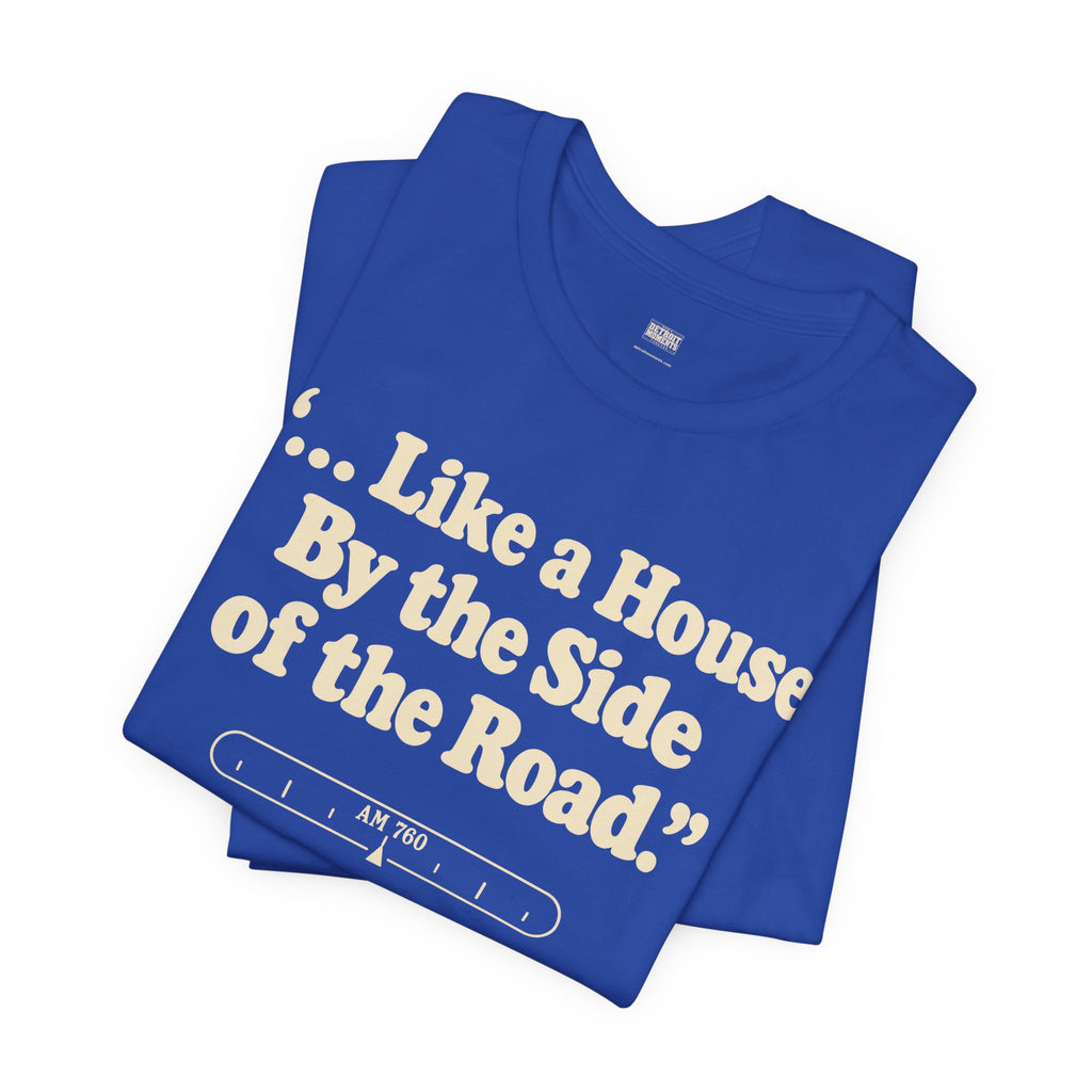 “... Like a House by the Side of the Road.” Tee
